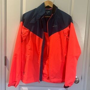 SUGOI Navy and Neon Pink Cycling Jacket-versa full zip 2/1 magnetic